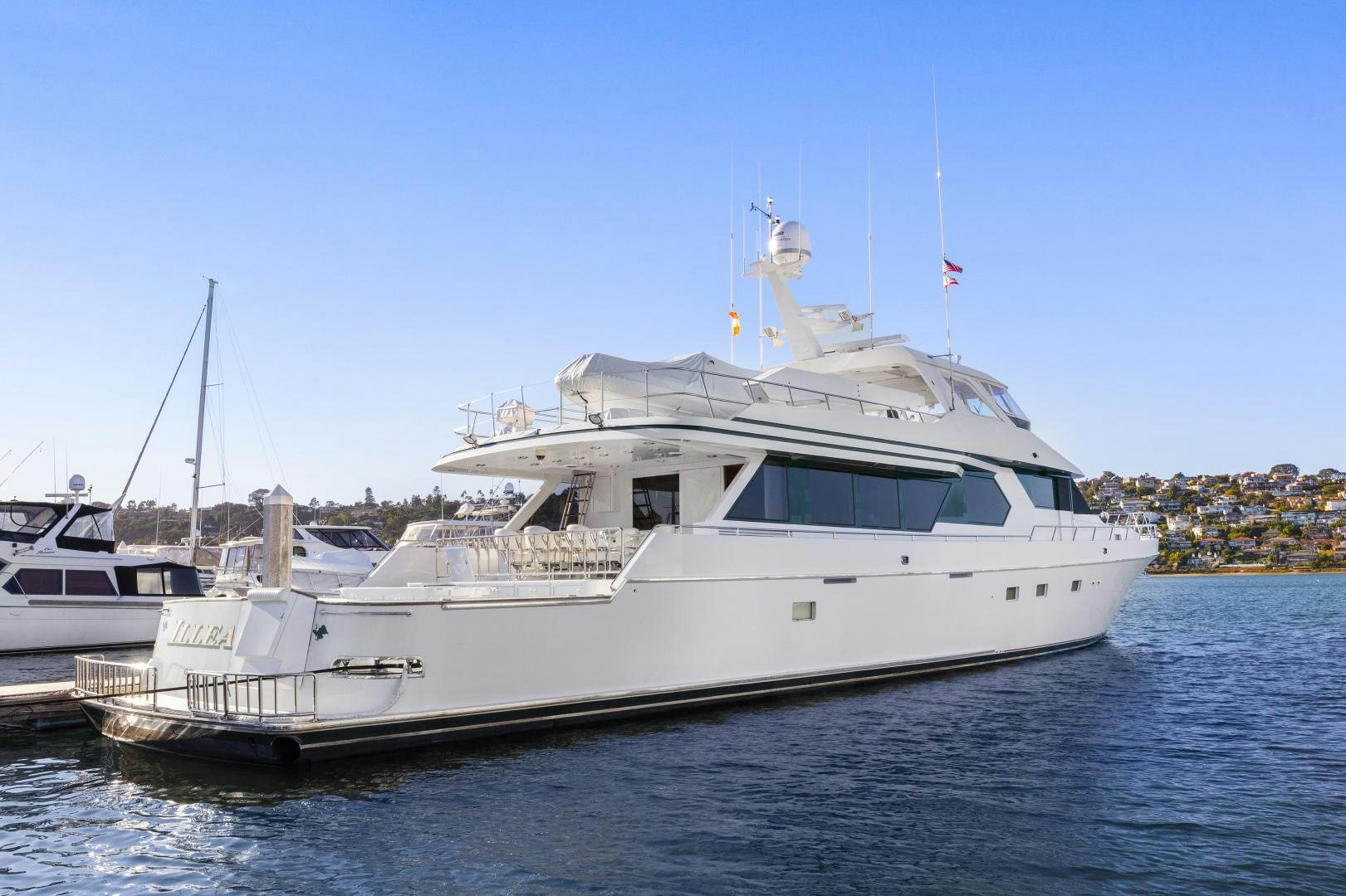 a large white boat in the water aboard ILLEAGLE Yacht for Sale