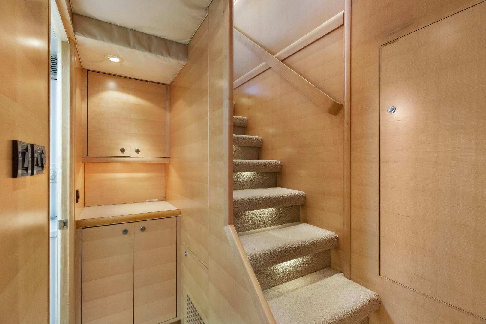 a wooden staircase in a room aboard ILLEAGLE Yacht for Sale