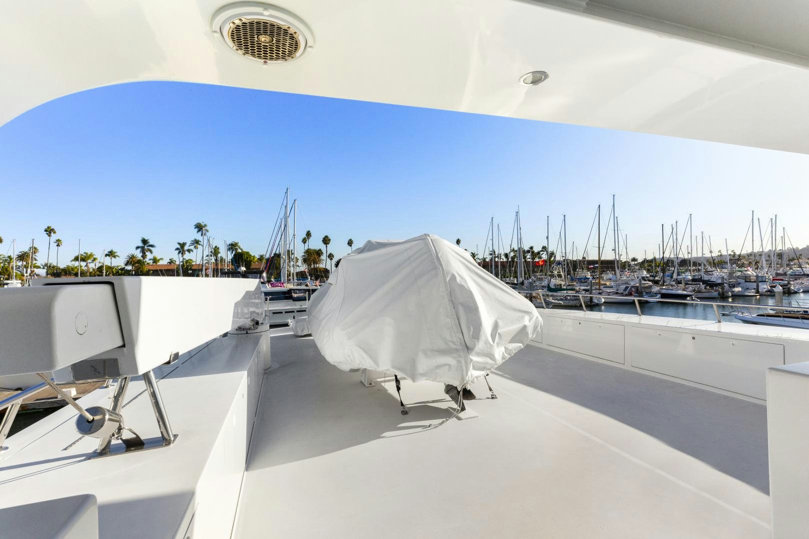 a white boat in a large body of water aboard ILLEAGLE Yacht for Sale