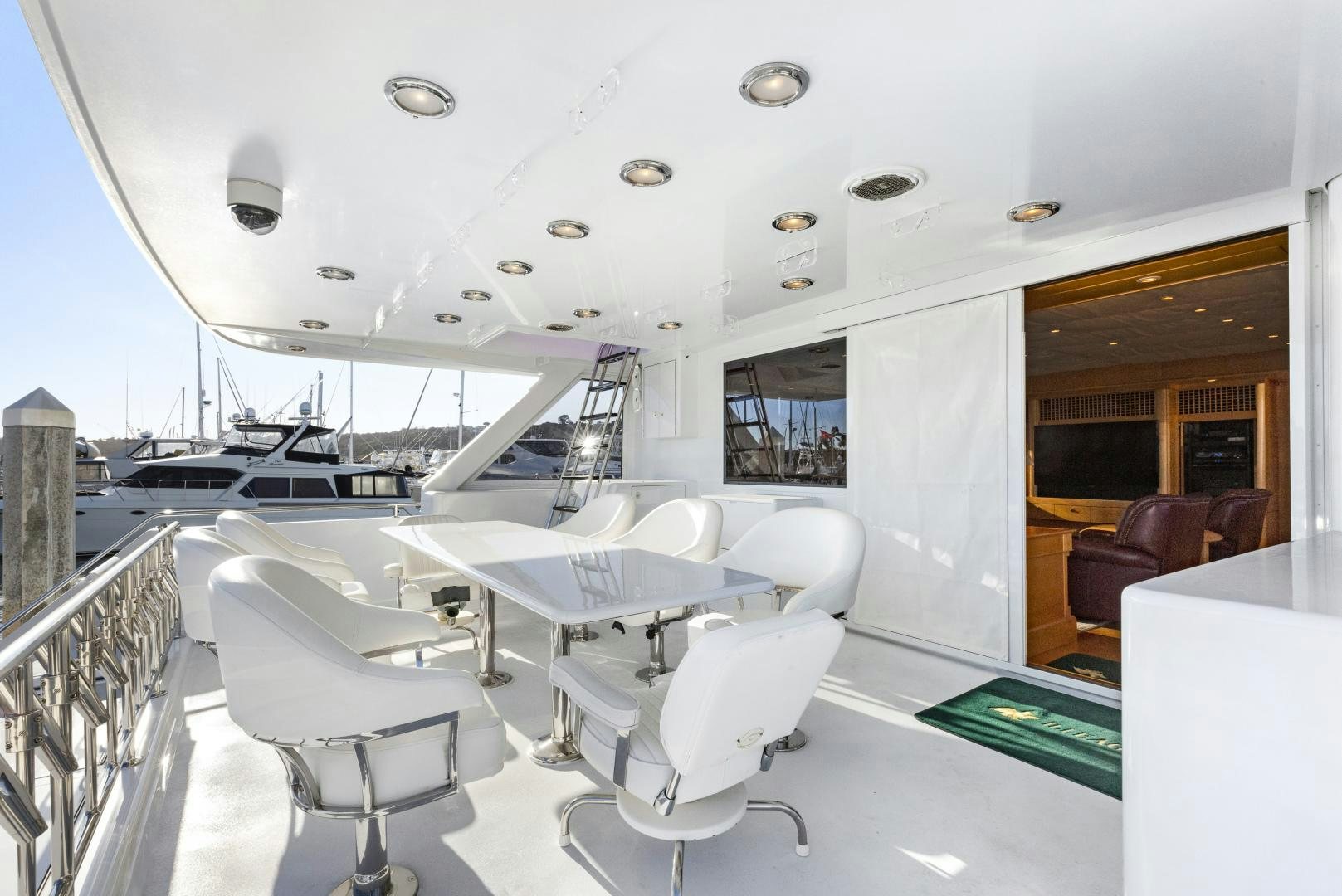 a room with many chairs and a row of airplanes aboard ILLEAGLE Yacht for Sale