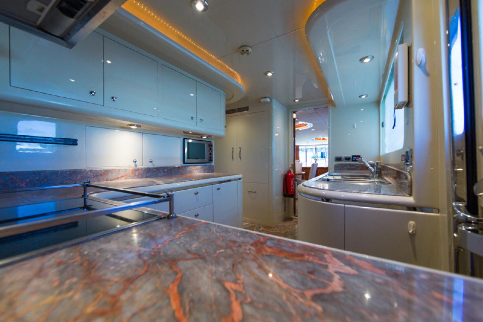 a kitchen with a countertop aboard MR. CAT Yacht for Sale