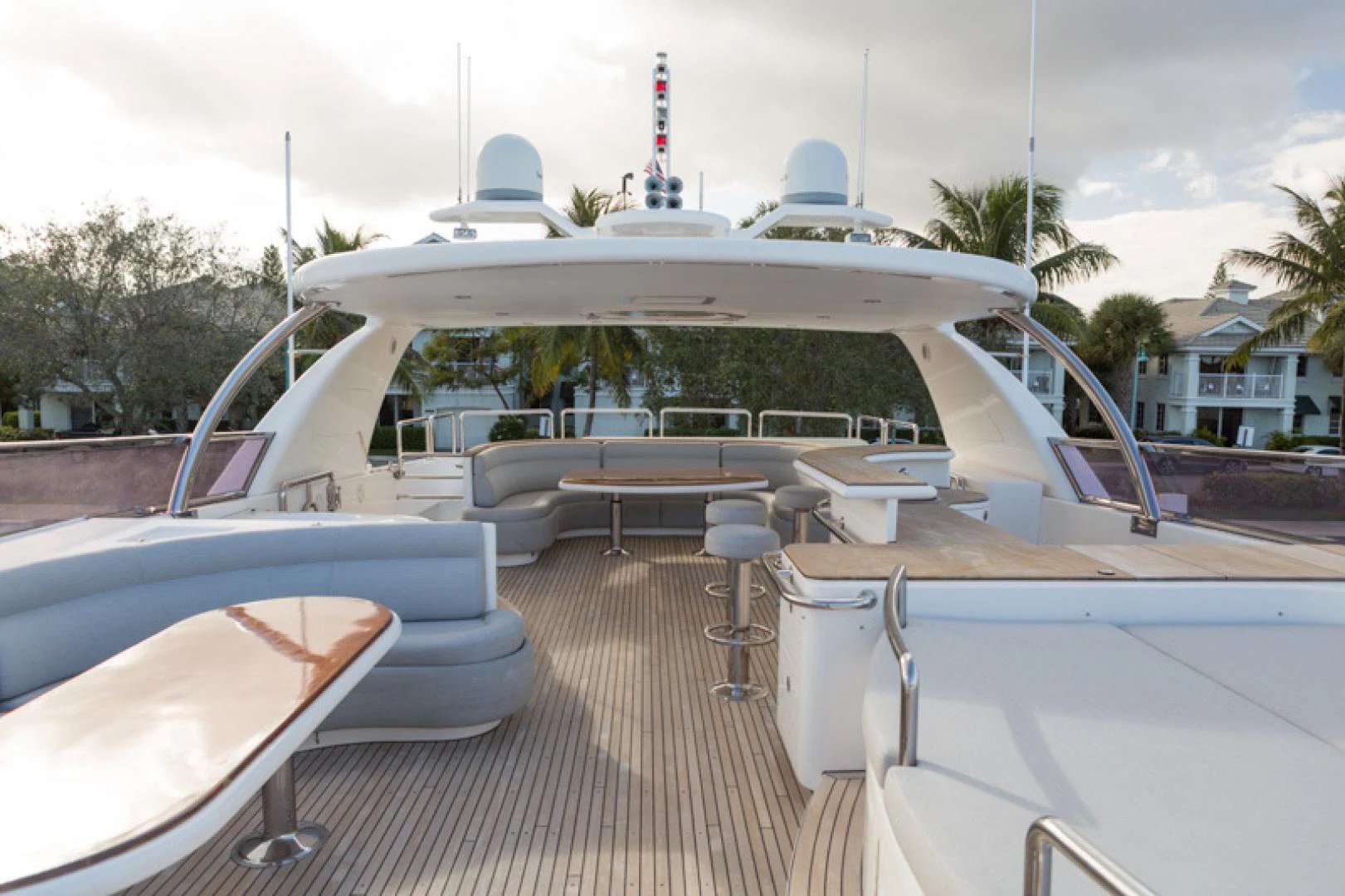 a large white boat with a deck aboard MR. CAT Yacht for Sale