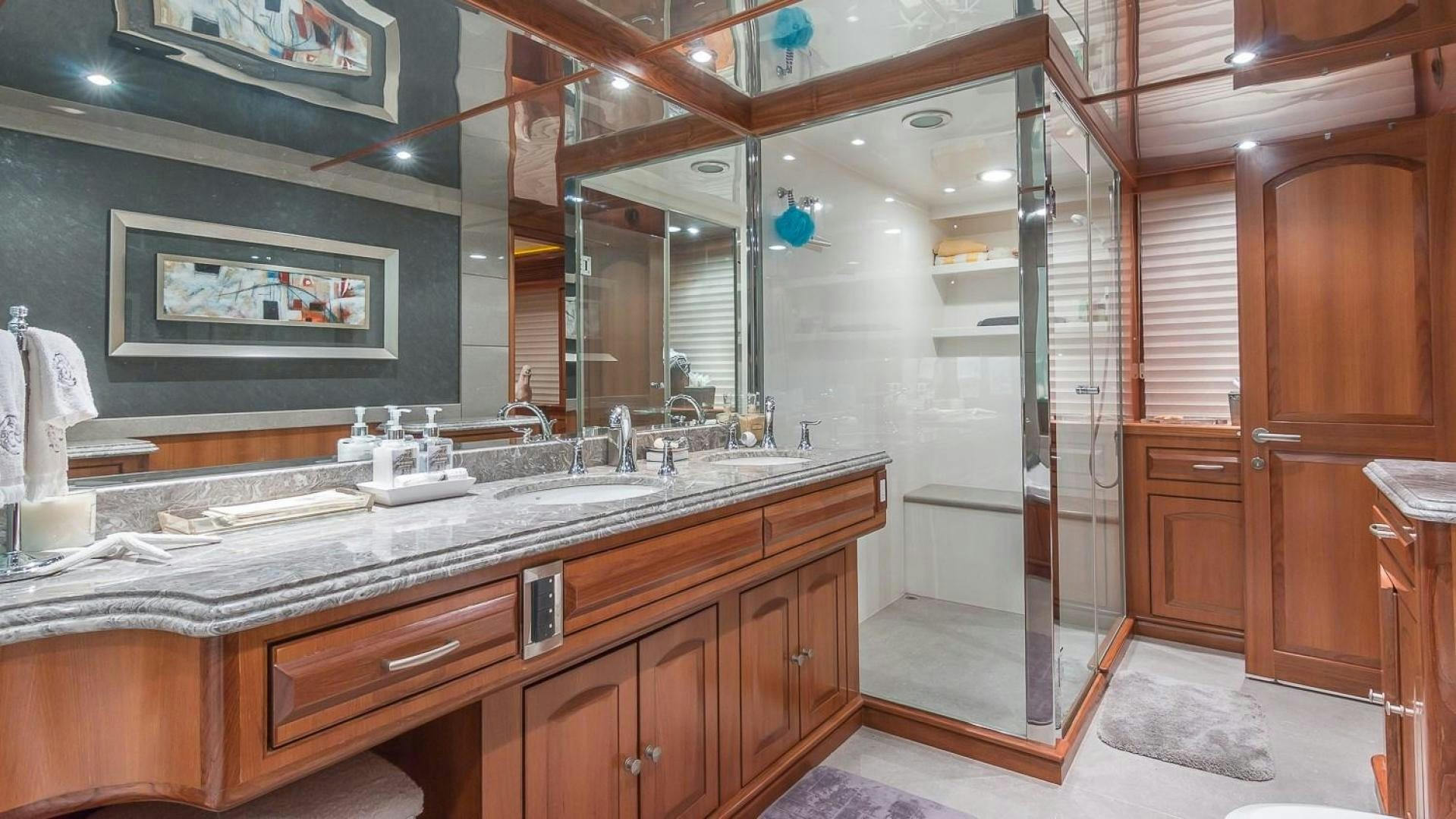 a bathroom with a large mirror aboard D FENCE Yacht for Sale