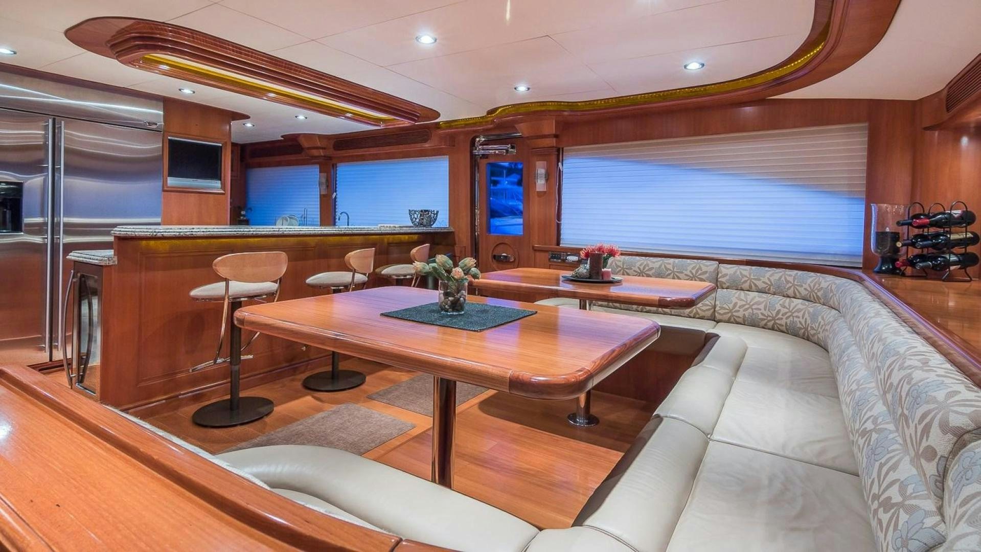 a room with a table and chairs aboard D FENCE Yacht for Sale