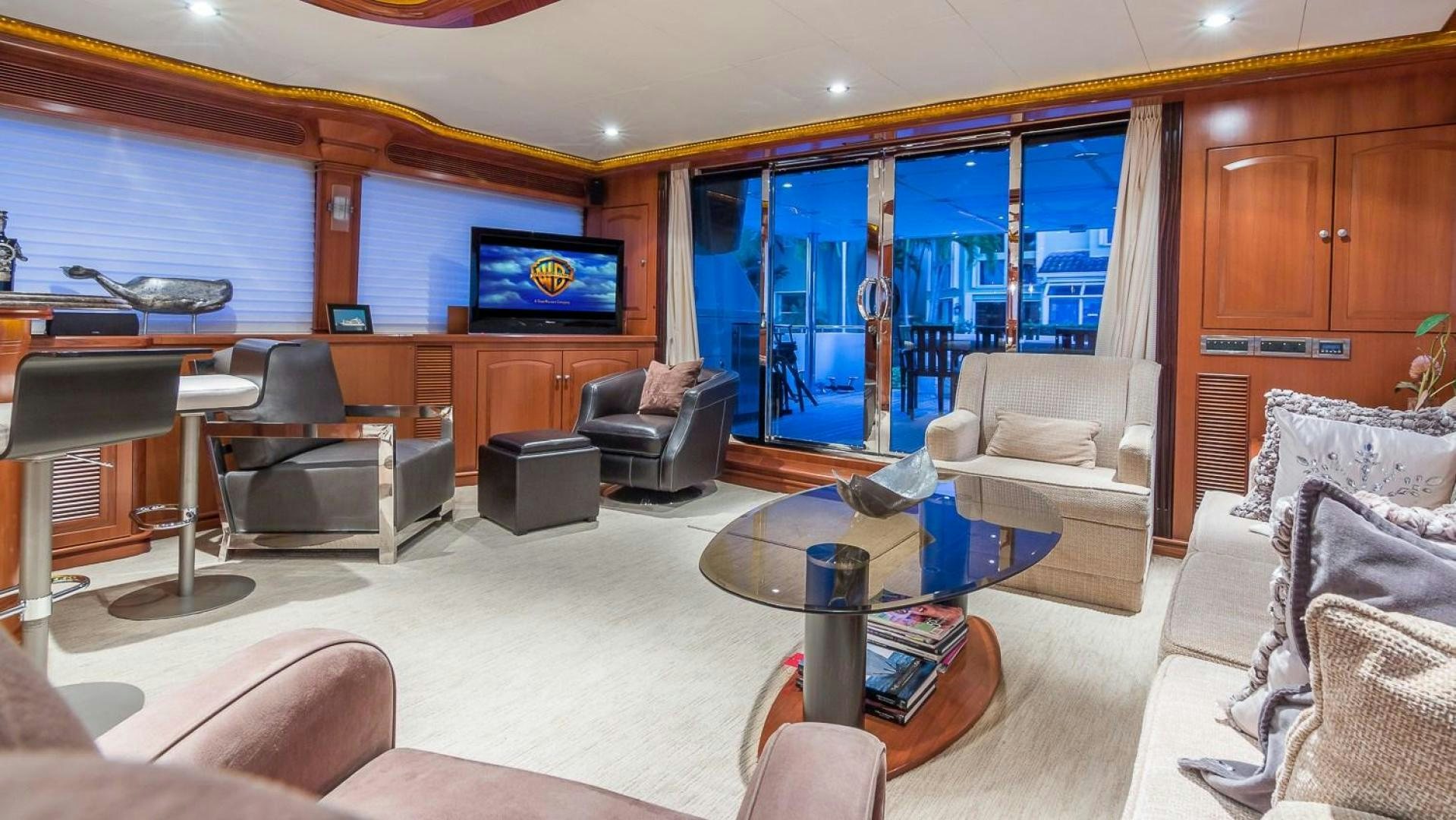 a living room with a large screen aboard D FENCE Yacht for Sale