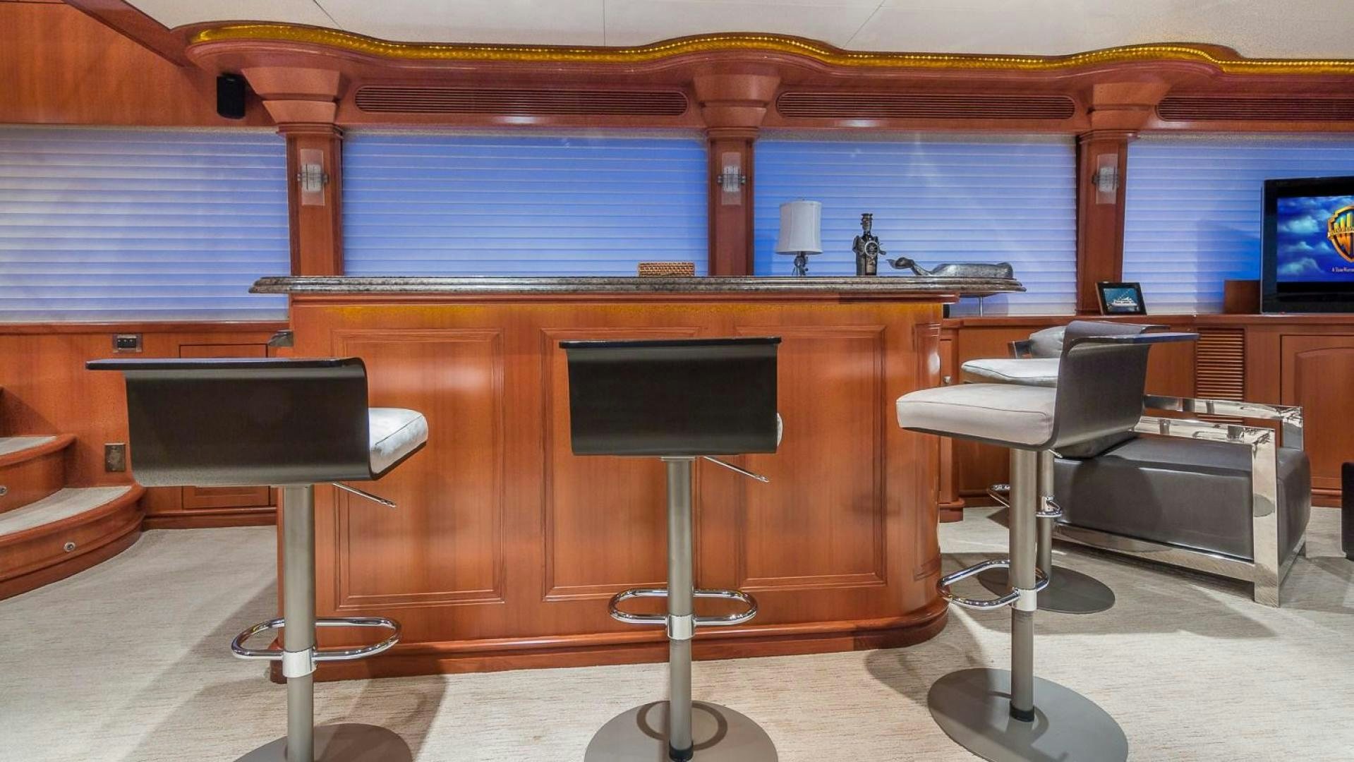 a room with a desk and chairs aboard D FENCE Yacht for Sale