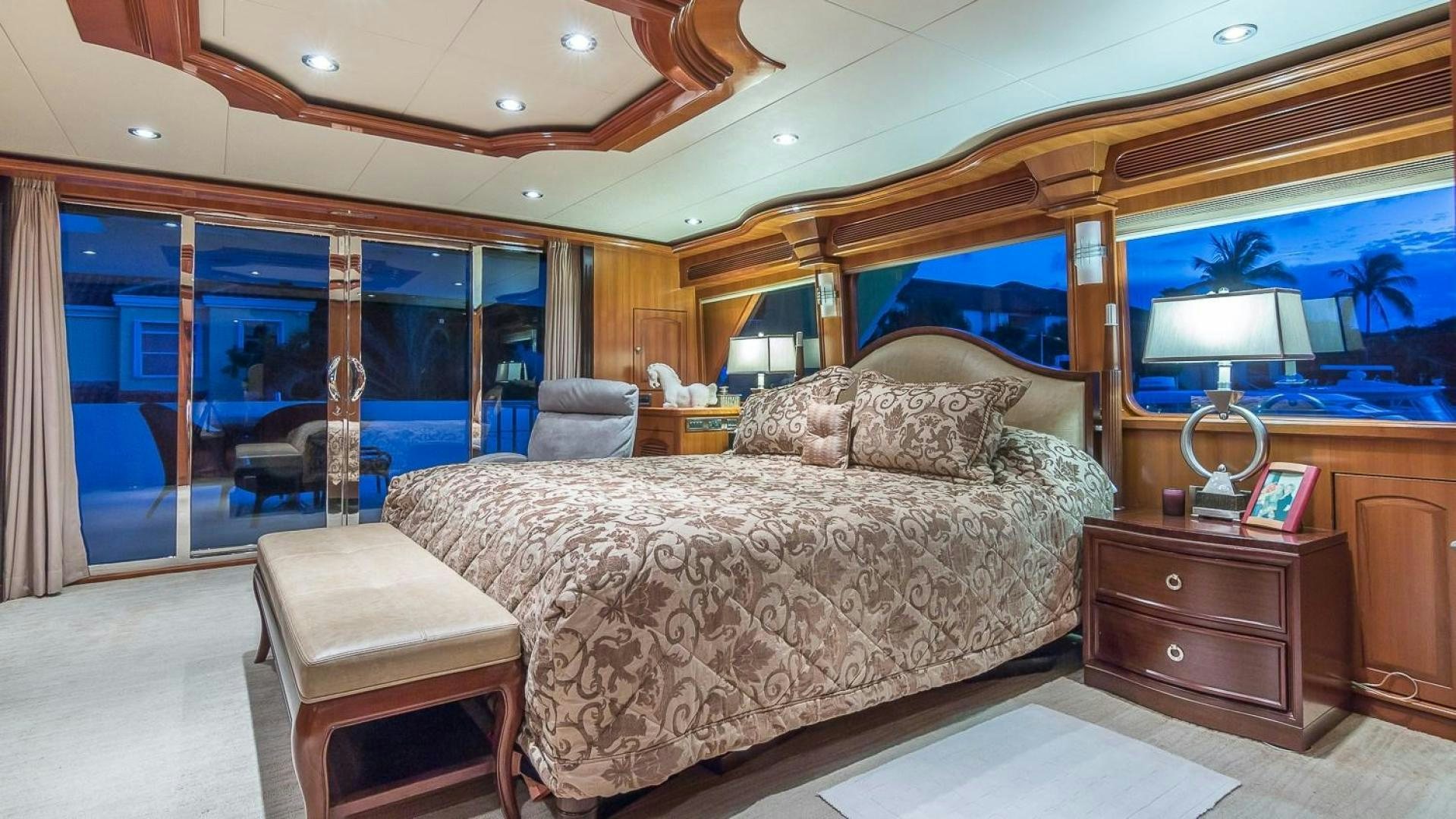 a large bed in a bedroom aboard D FENCE Yacht for Sale
