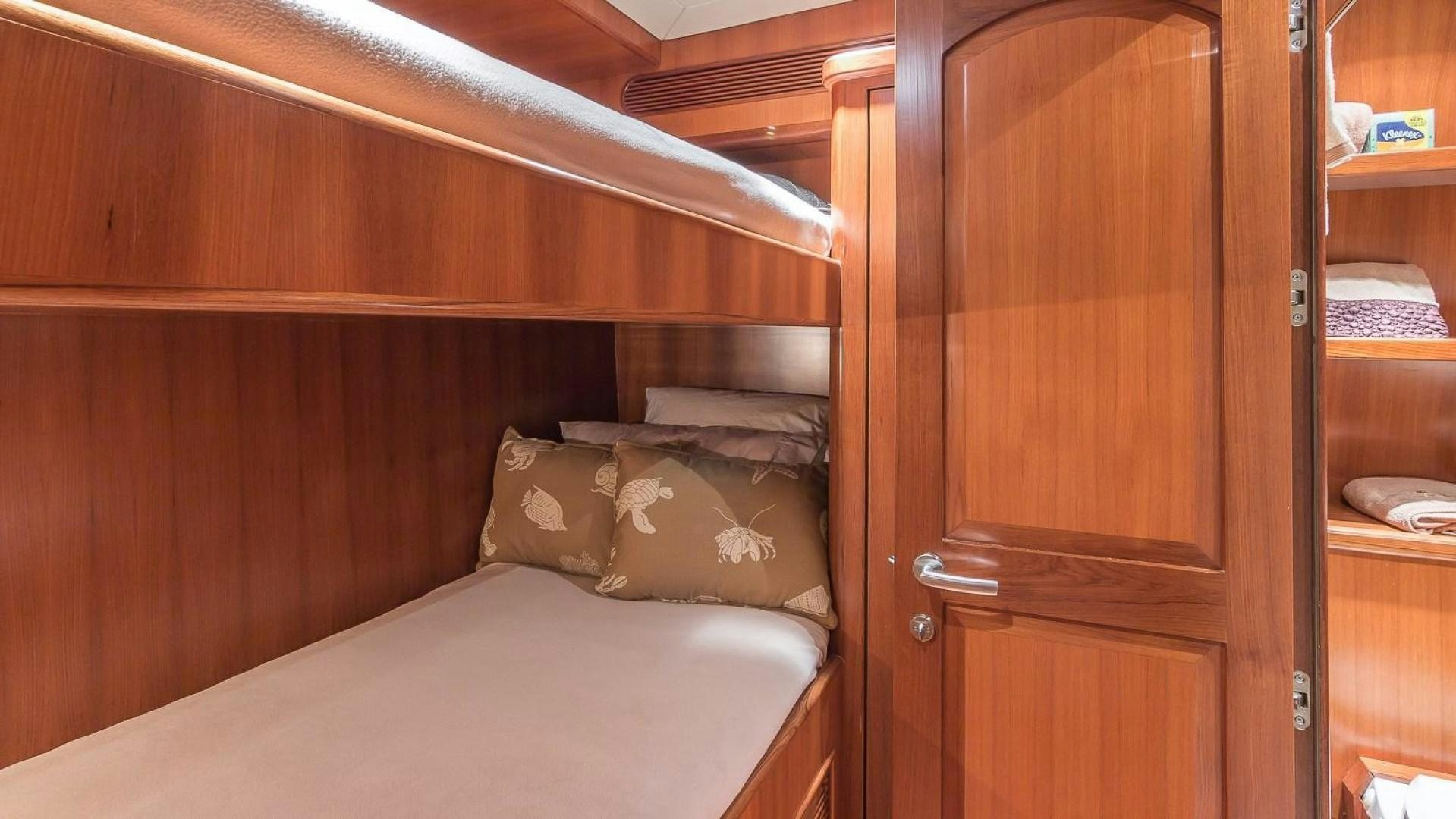 a bed in a room aboard D FENCE Yacht for Sale