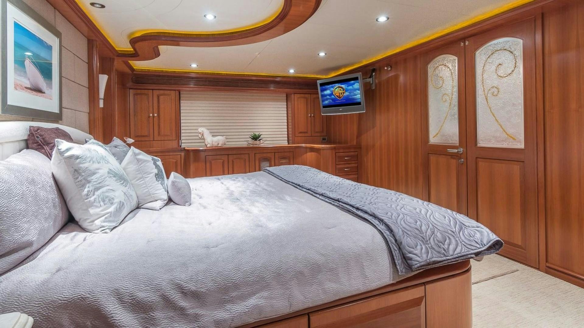 a bed with white sheets aboard D FENCE Yacht for Sale
