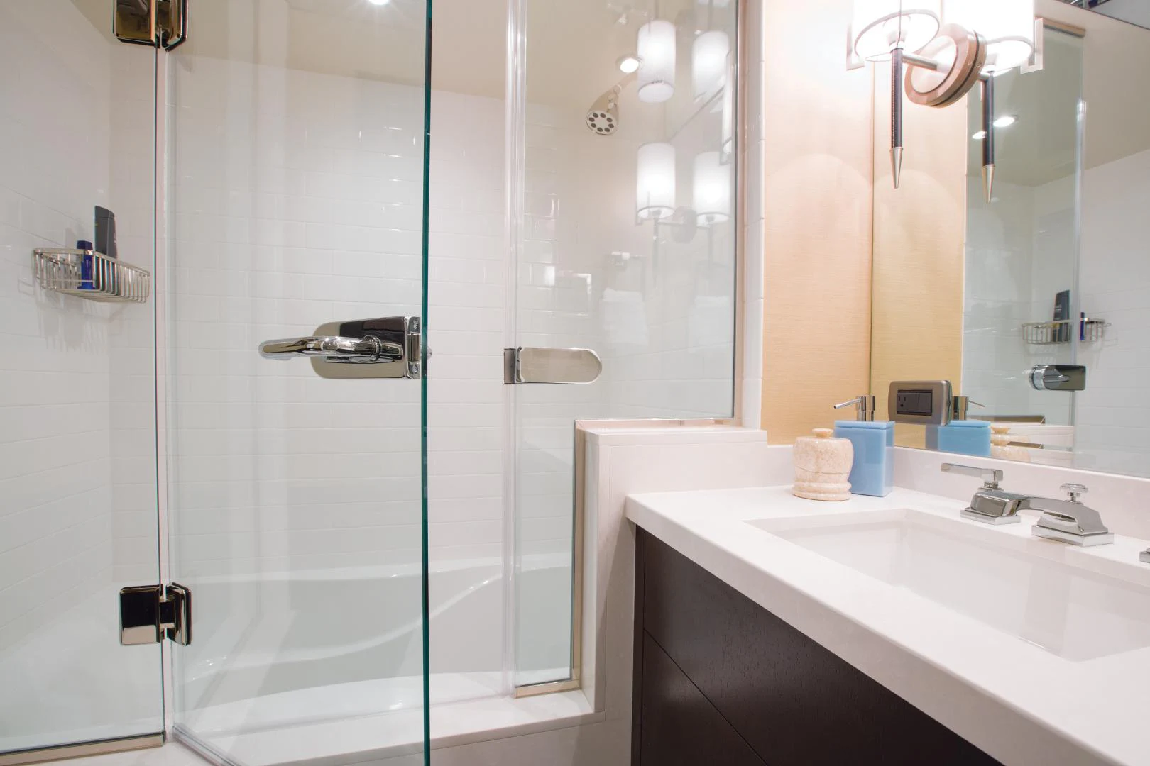 a bathroom with a shower and sink aboard 2021 HATTERAS 105RPH Yacht for Sale