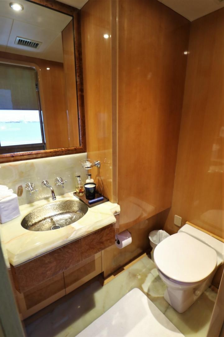 a bathroom with a sink and a toilet aboard No Name Yacht for Sale