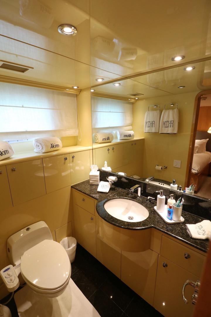 a bathroom with a sink and a toilet aboard No Name Yacht for Sale