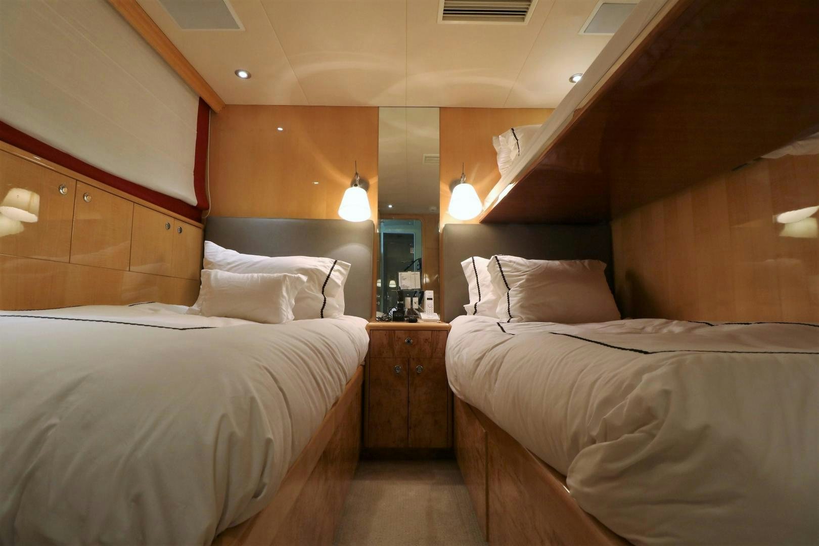 a room with two beds aboard No Name Yacht for Sale