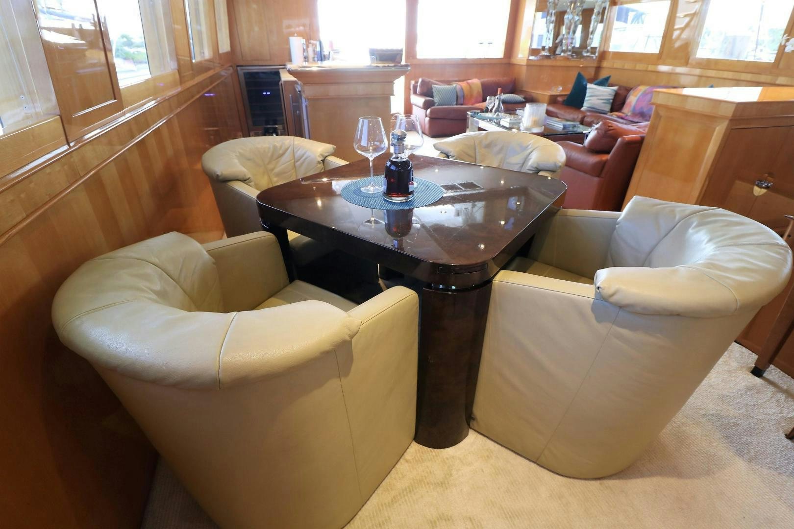a person sitting at a table aboard No Name Yacht for Sale