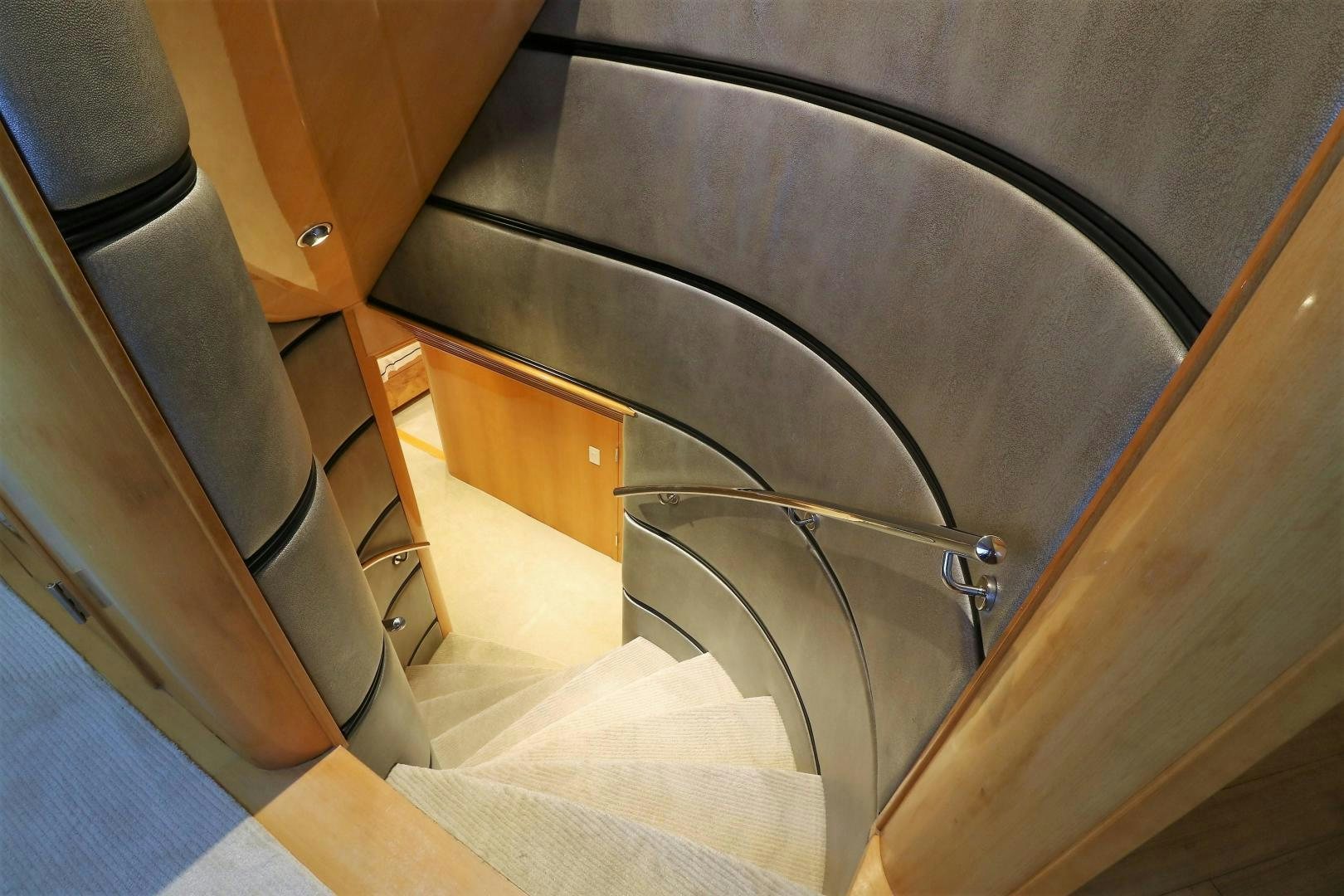 a metal spiral staircase aboard No Name Yacht for Sale