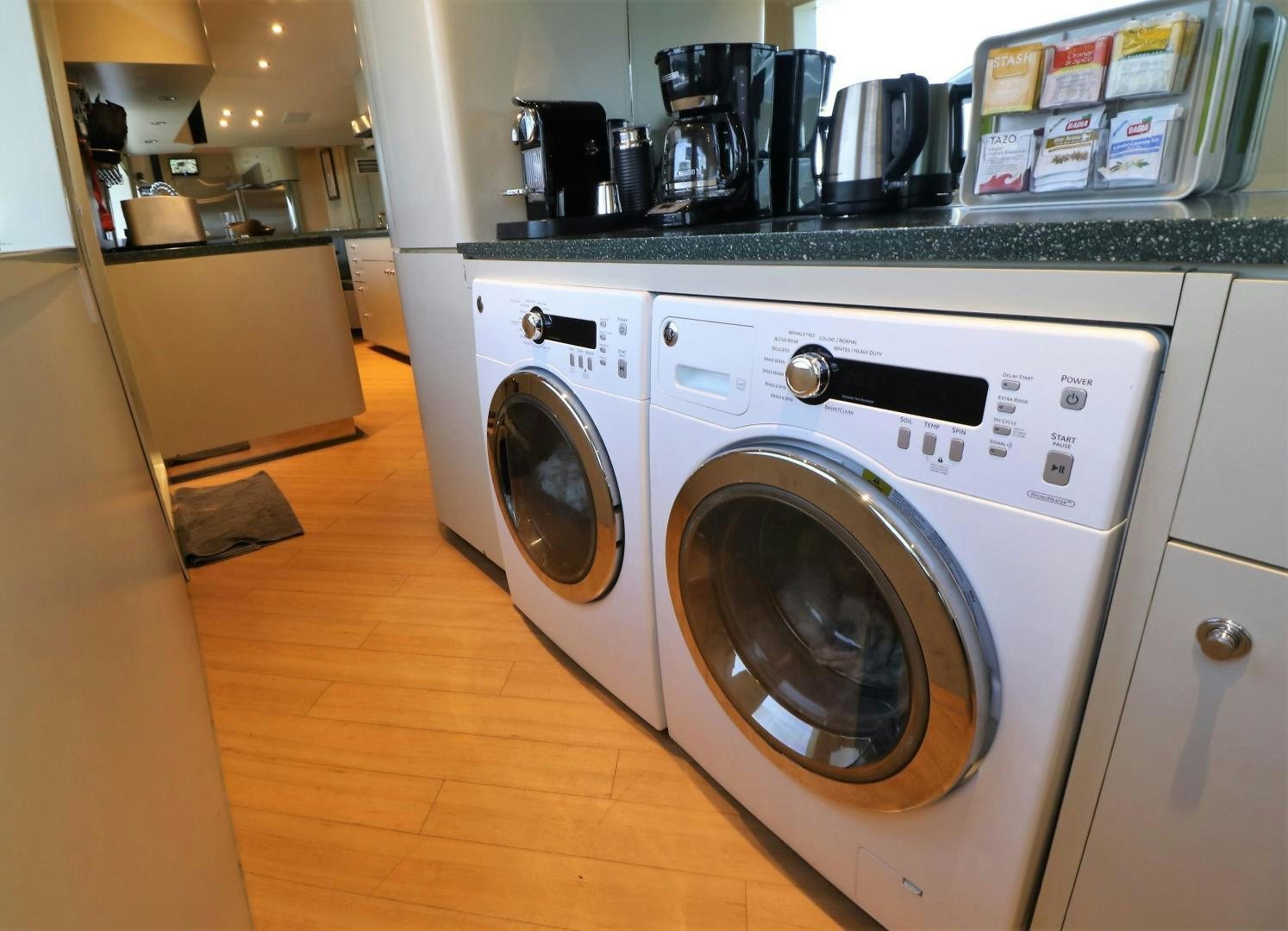 a white washing machine aboard No Name Yacht for Sale