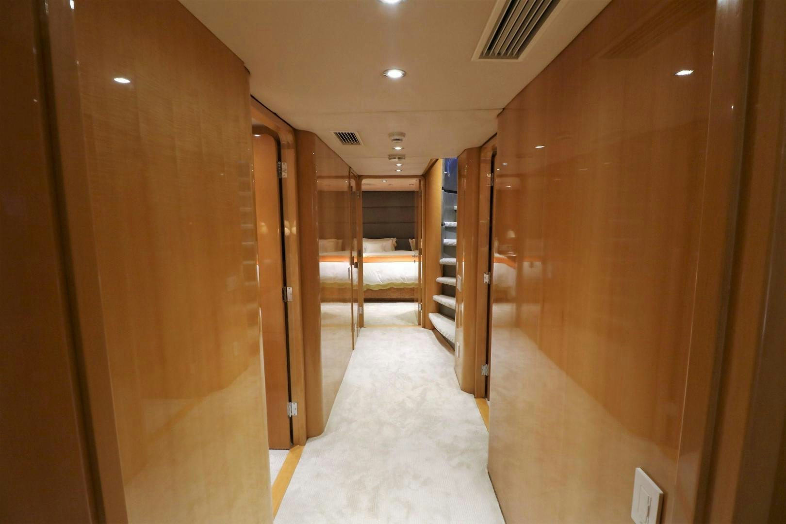 a hallway with a door and a hallway aboard No Name Yacht for Sale