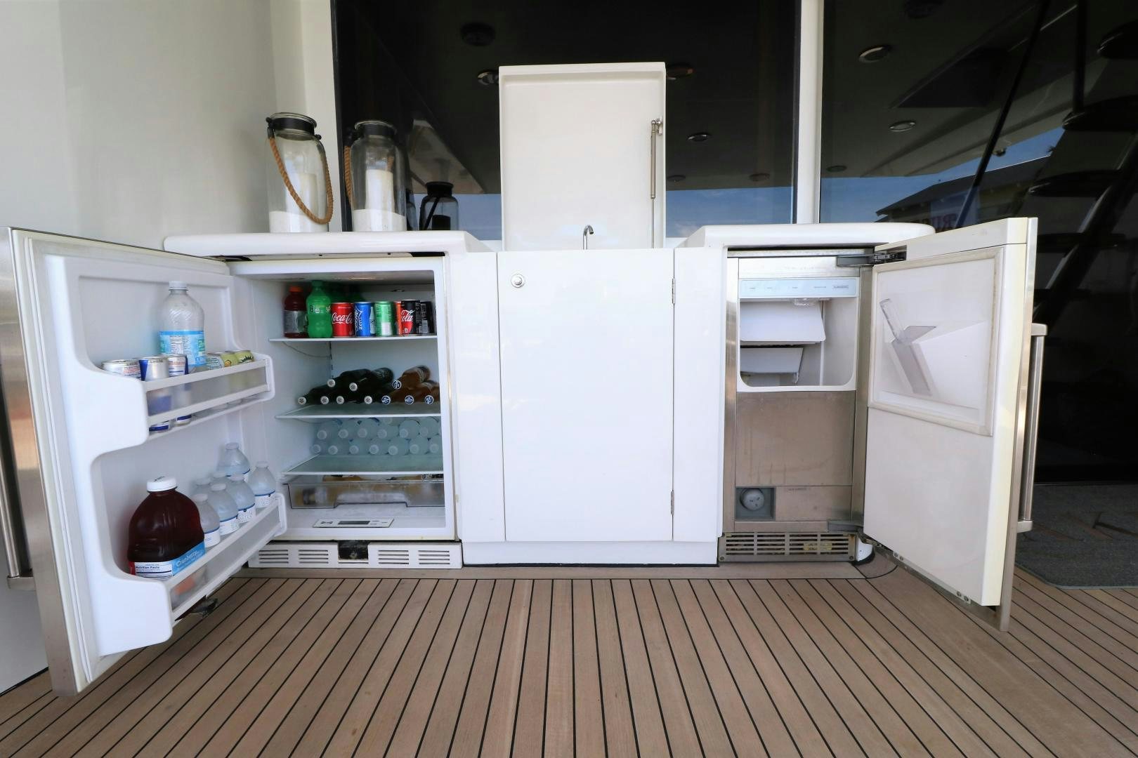 a kitchen with a refrigerator and freezer aboard No Name Yacht for Sale