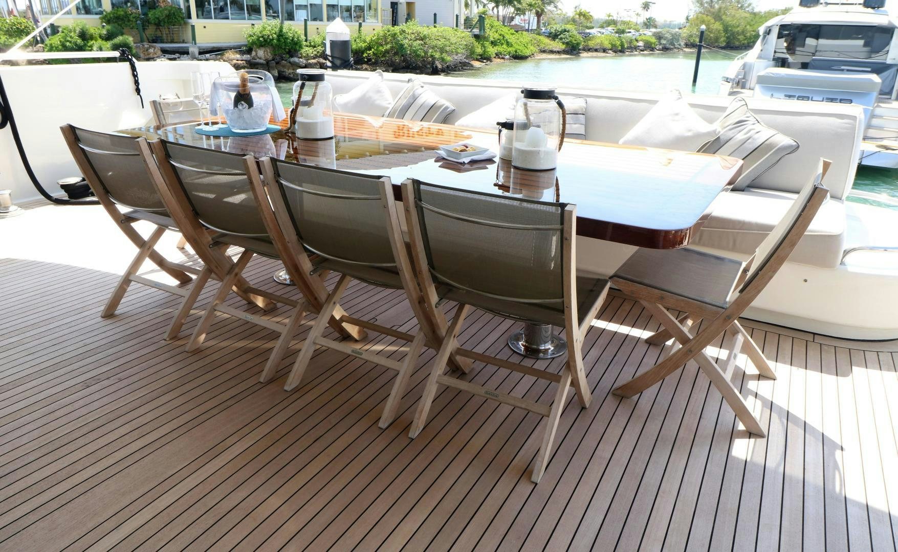 a group of chairs around a table aboard No Name Yacht for Sale