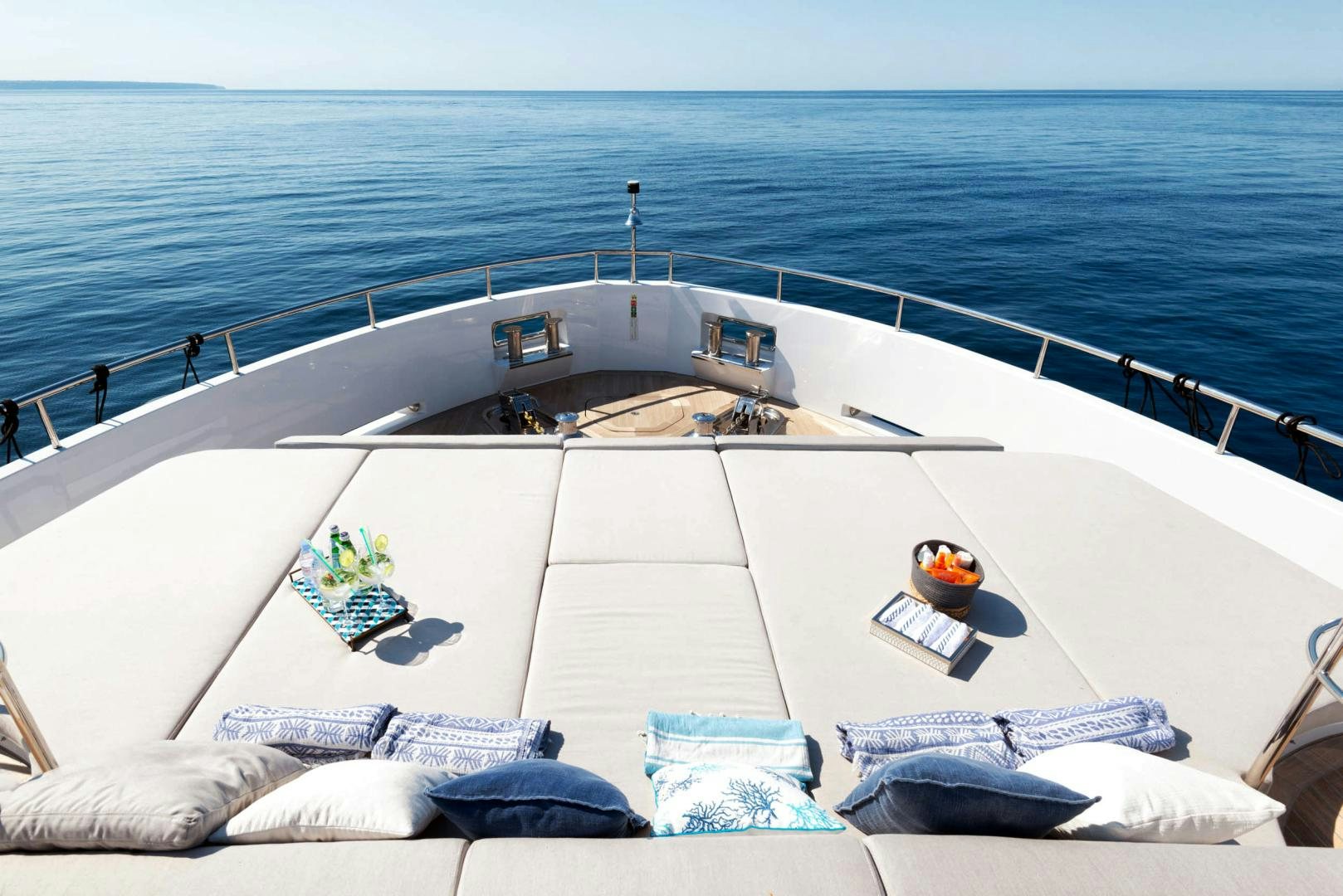 a large white boat on a body of water aboard CURFEW II Yacht for Sale