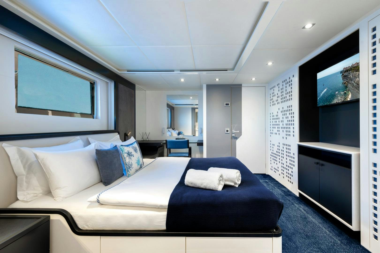 a large bed in a room aboard CURFEW II Yacht for Sale