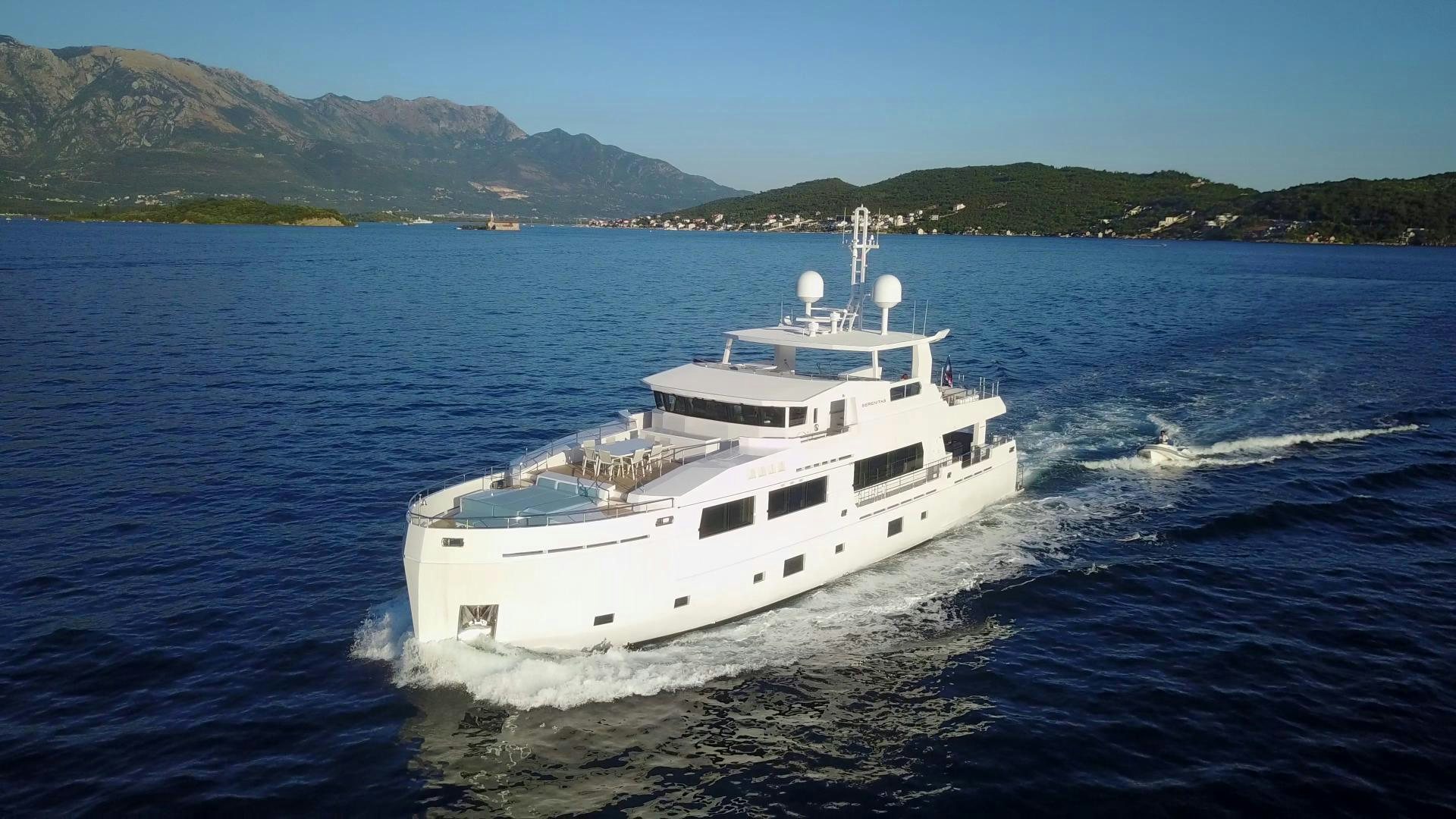 a white yacht on the water aboard CURFEW II Yacht for Sale