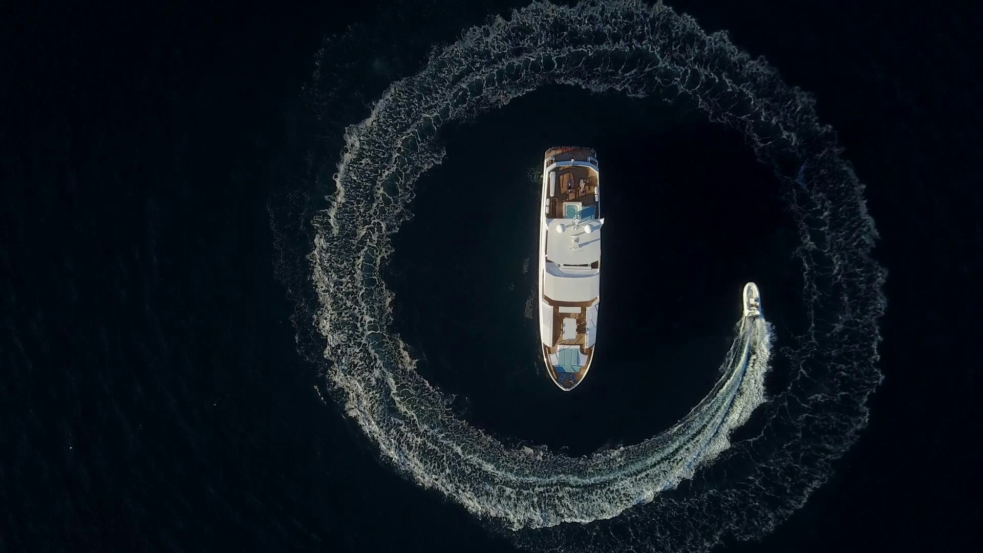 a car on a black background aboard CURFEW II Yacht for Sale