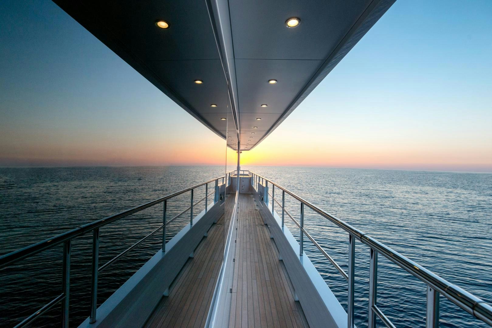 a long wooden dock over water aboard CURFEW II Yacht for Sale