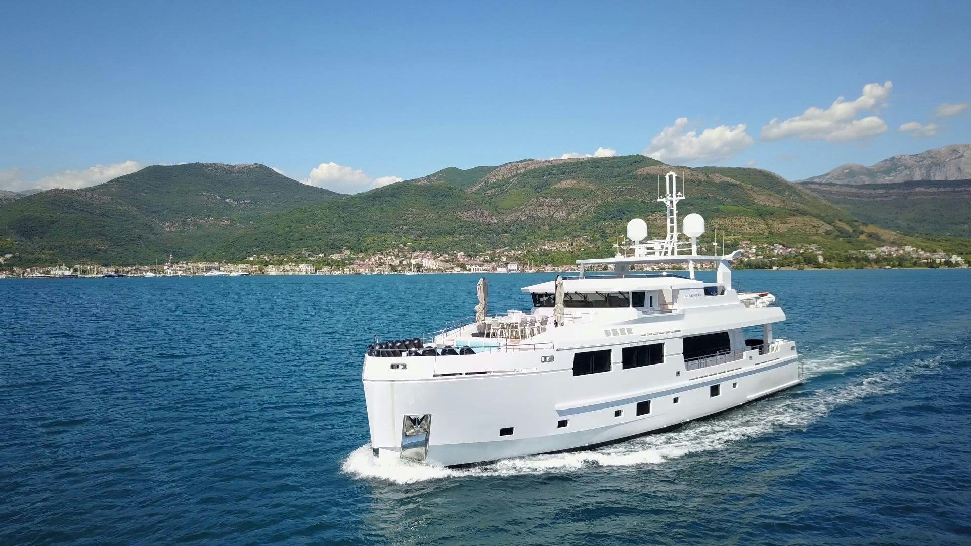 a white boat on the water aboard CURFEW II Yacht for Sale