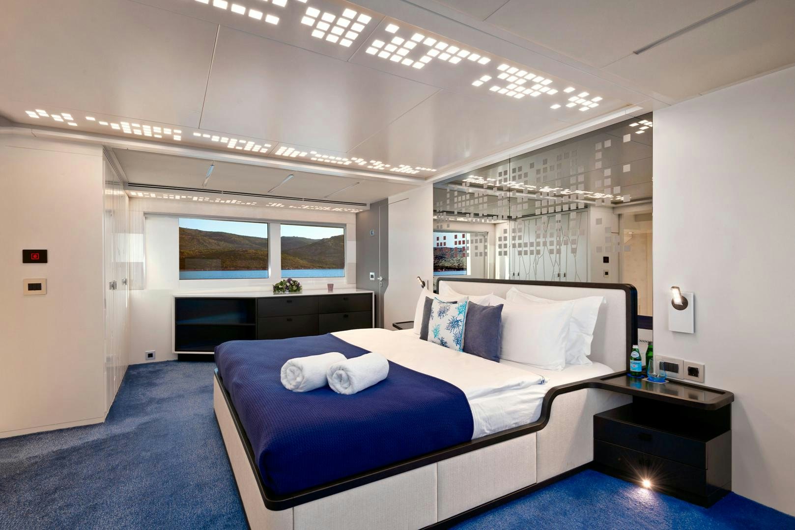 a room with a bed and a desk aboard CURFEW II Yacht for Sale