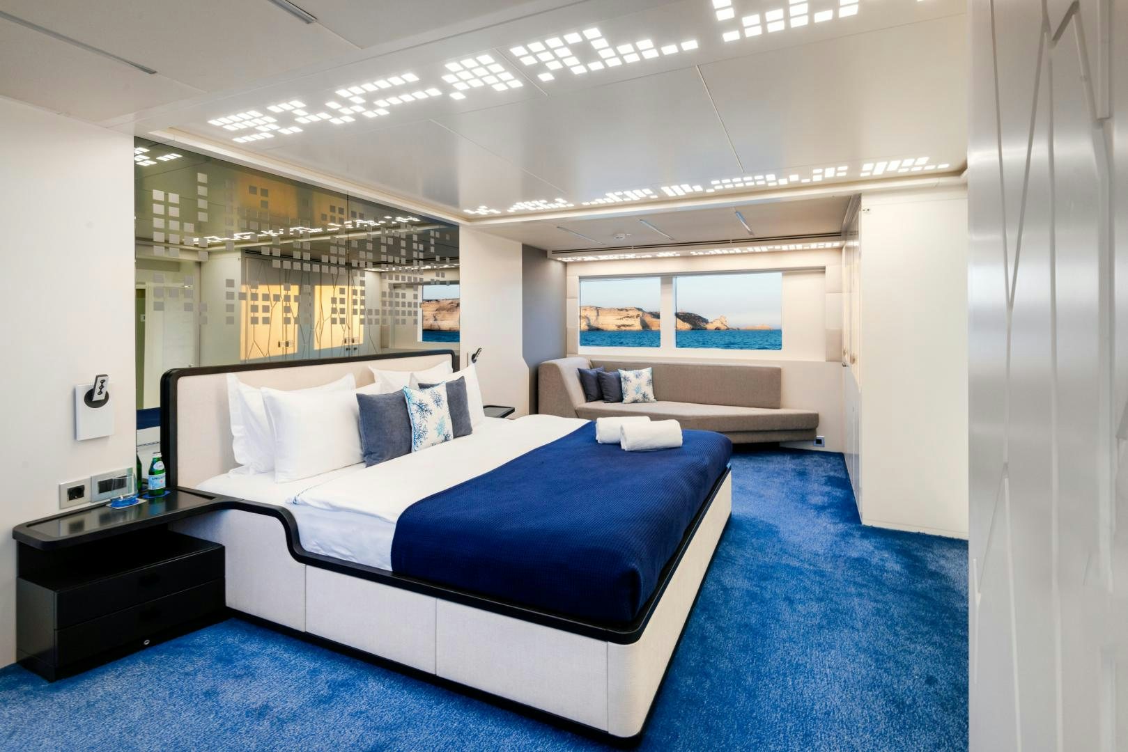 a room with a bed and a desk aboard CURFEW II Yacht for Sale