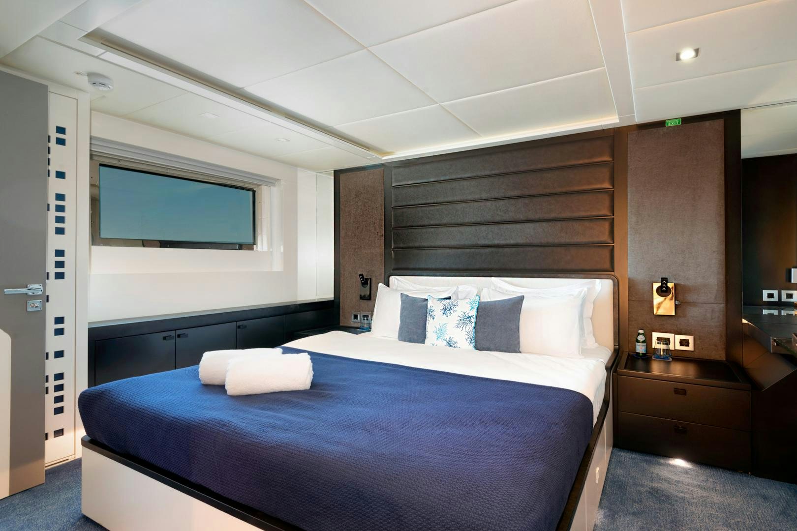 a bed in a room aboard CURFEW II Yacht for Sale