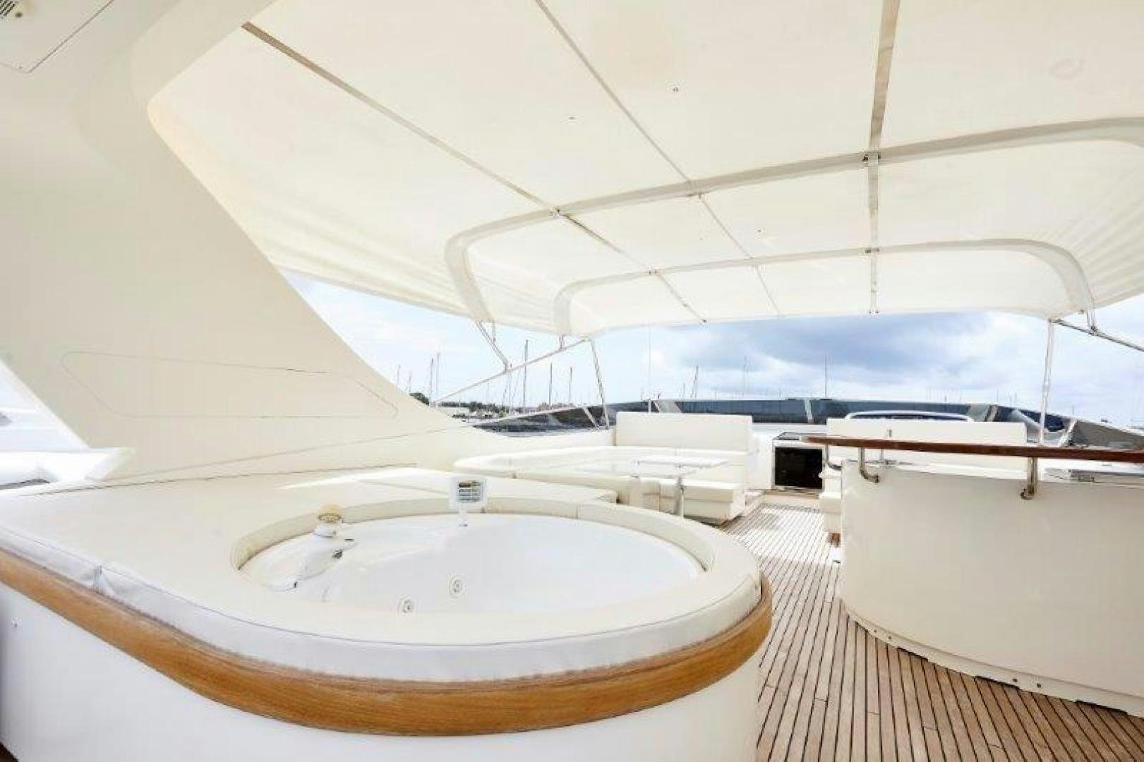 a large white swimming pool aboard YASSON Yacht for Sale