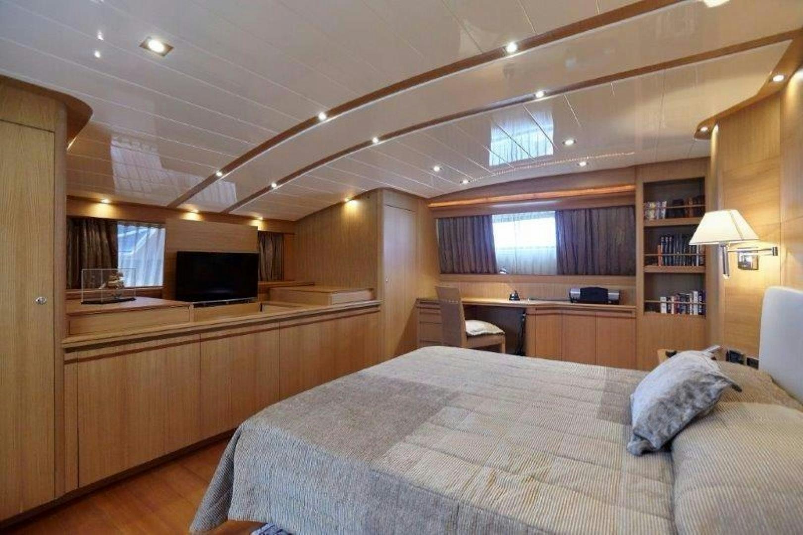 a bed in a room aboard YASSON Yacht for Sale