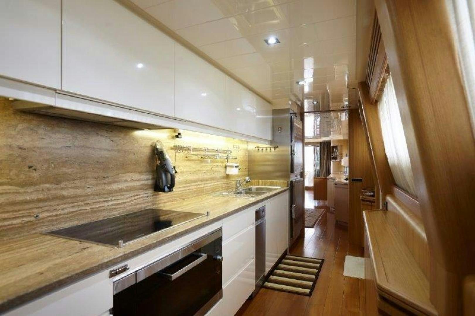 a kitchen with a large countertop aboard YASSON Yacht for Sale