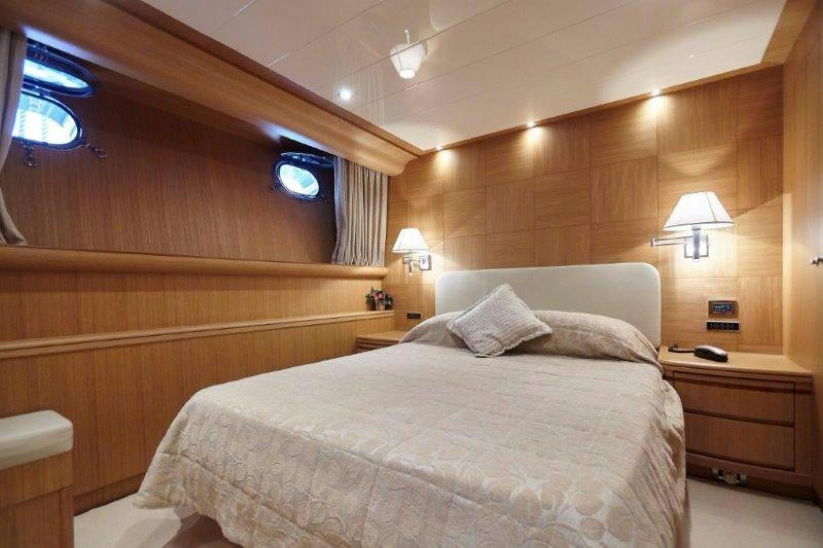 a bed in a room aboard YASSON Yacht for Sale