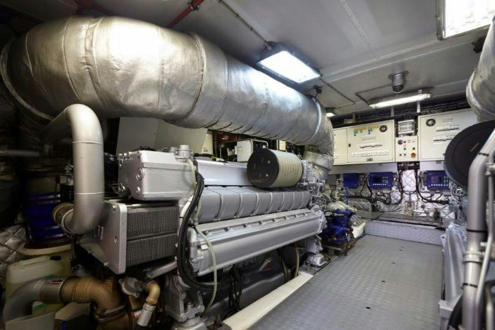 a large metal machine in a factory aboard YASSON Yacht for Sale