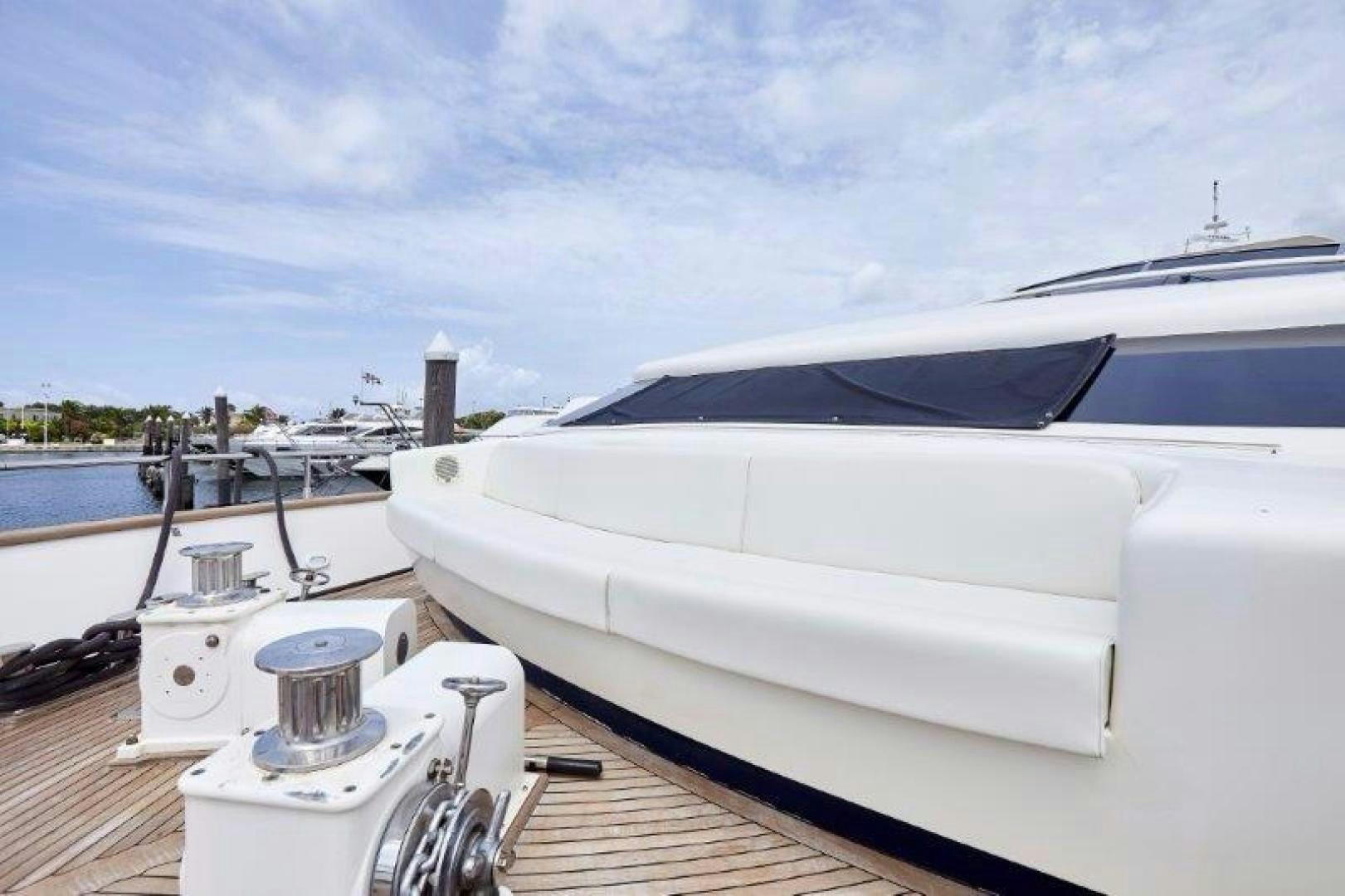 a boat docked at a pier aboard YASSON Yacht for Sale
