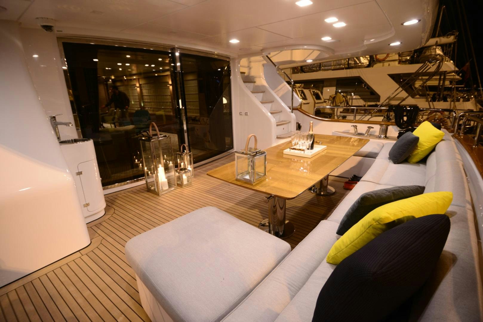 a living room with a large mirror aboard No Name Yacht for Sale