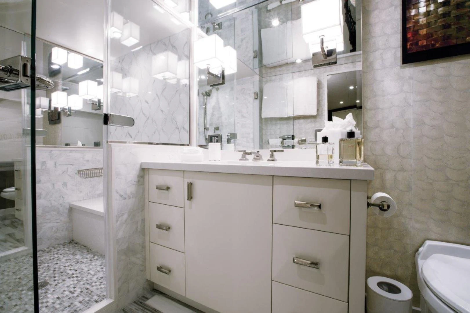 a bathroom with a glass shower aboard 105 RAISED PILOTHOUSE Yacht for Sale