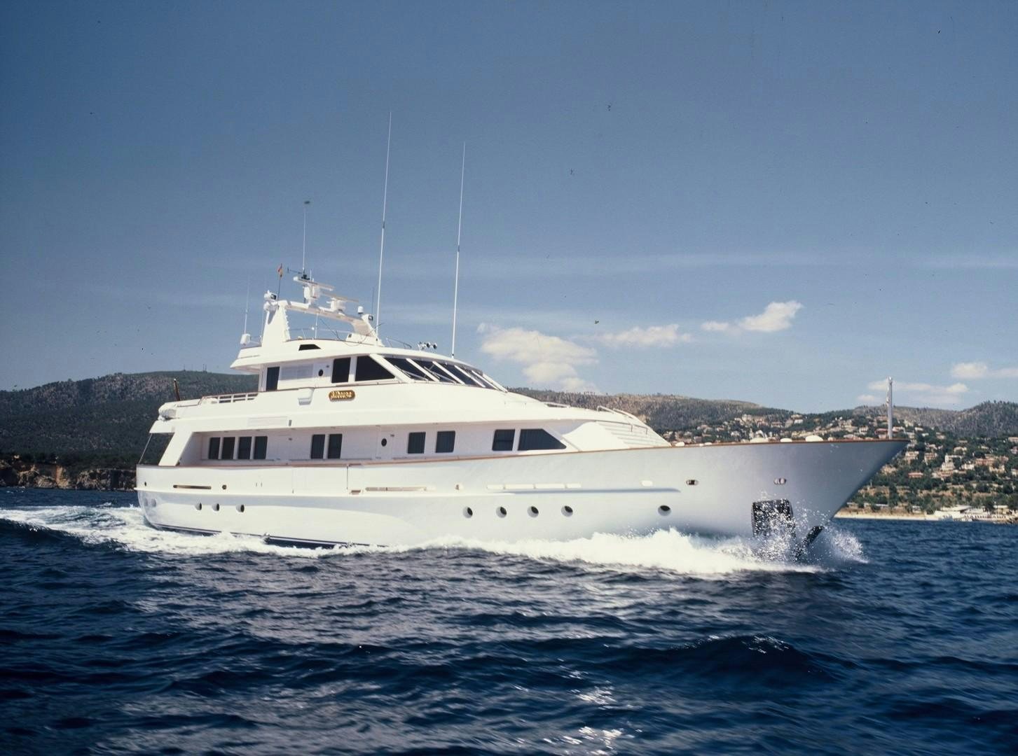 a white boat on the water aboard No Name Yacht for Sale