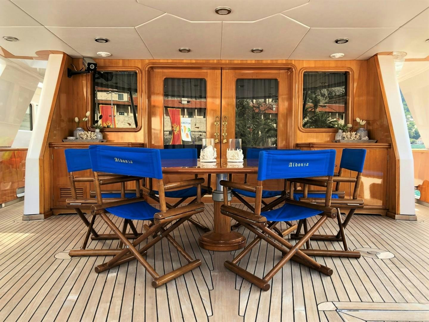 a room with tables and chairs aboard NO NAME Yacht for Sale