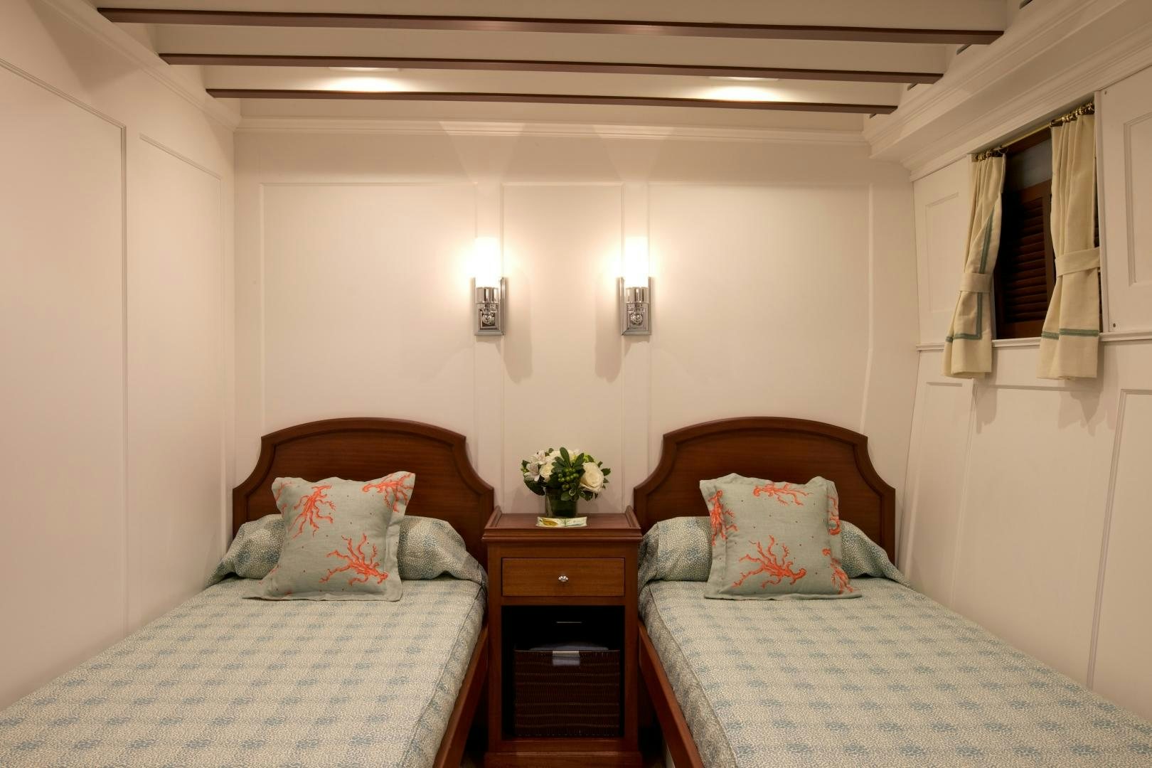 a couple of beds in a hotel room aboard FREEDOM Yacht for Sale