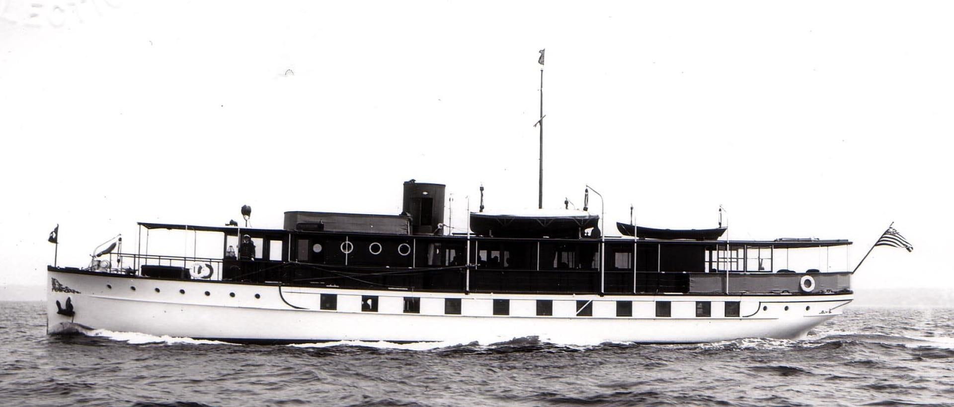 a large ship on the water aboard FREEDOM Yacht for Sale