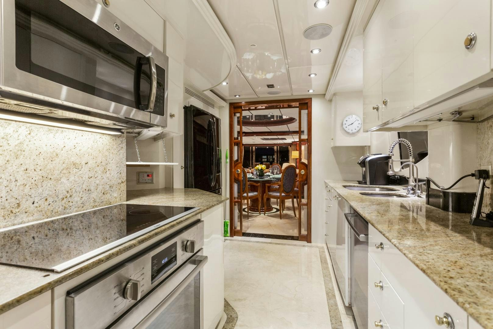 a kitchen with a stove and oven aboard ANA’S INSPIRATION Yacht for Sale