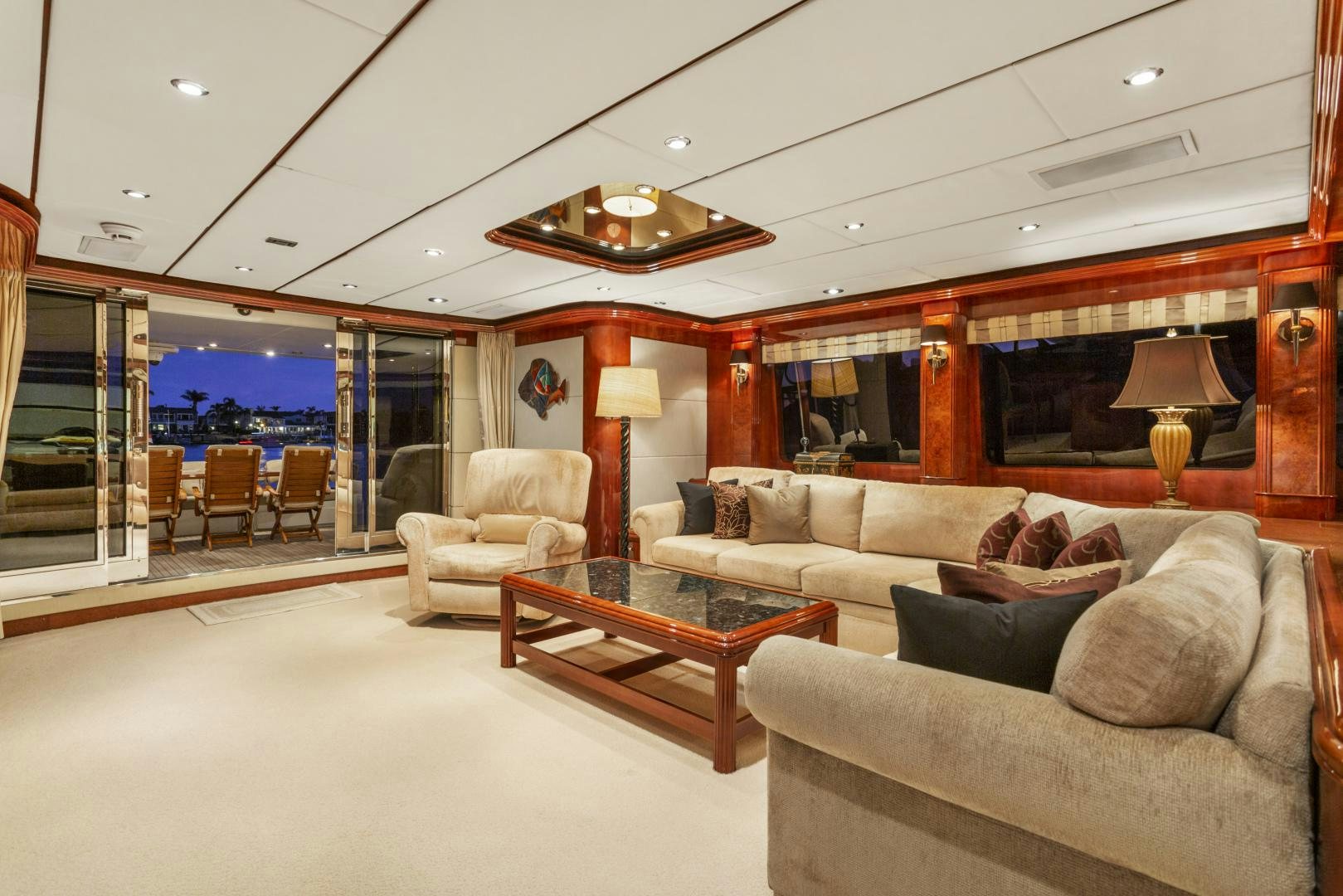 a living room with a large window aboard ANA’S INSPIRATION Yacht for Sale