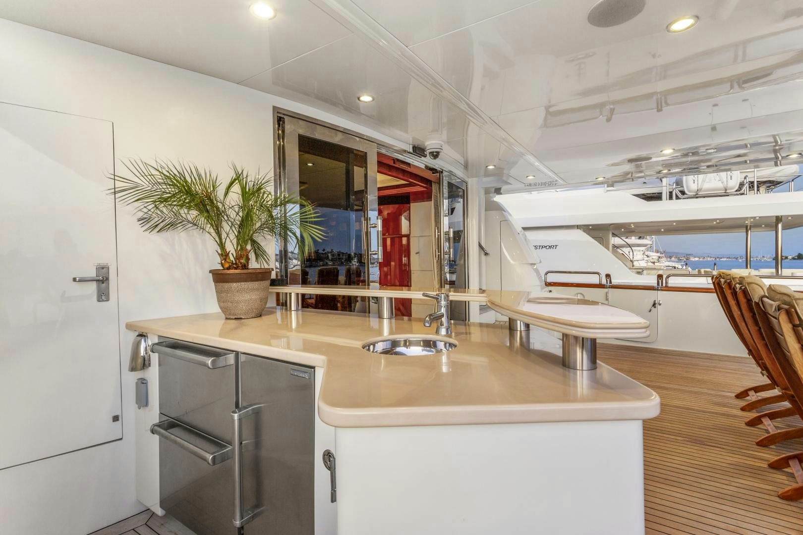 a kitchen with a sink and a refrigerator aboard ANA’S INSPIRATION Yacht for Sale