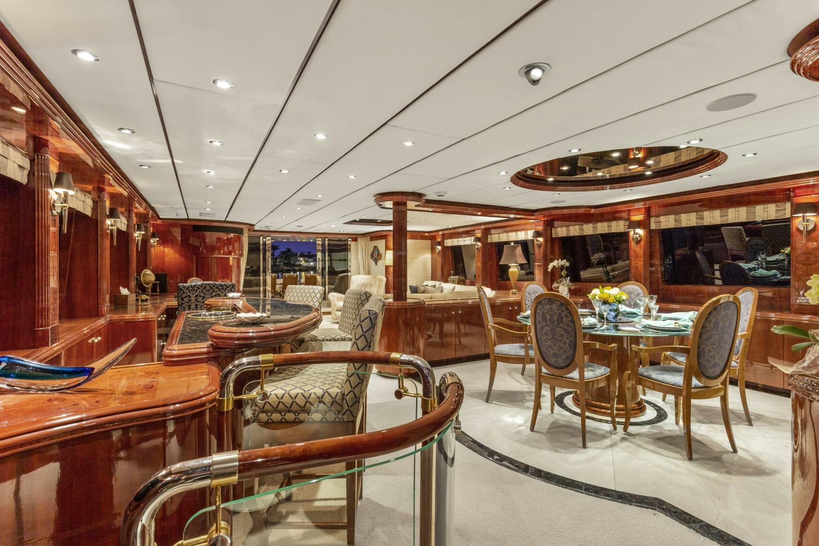a restaurant with tables and chairs aboard ANA’S INSPIRATION Yacht for Sale