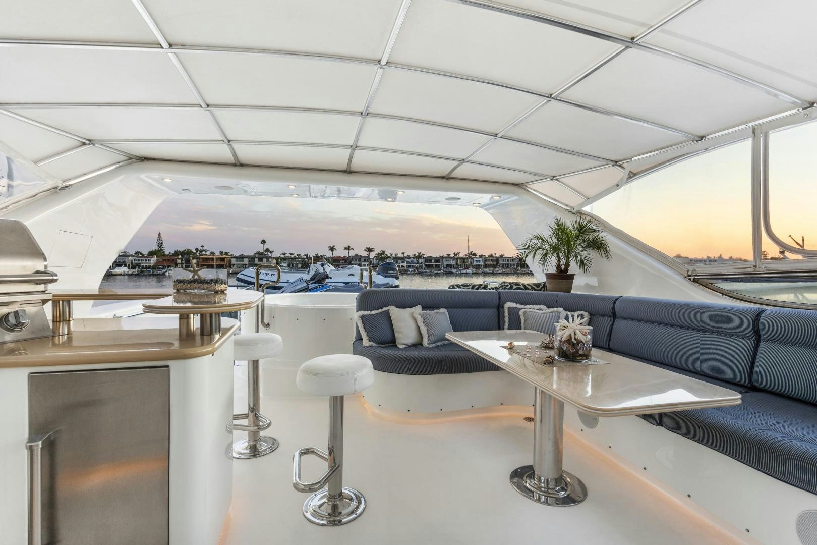 a room with a table and chairs aboard ANA’S INSPIRATION Yacht for Sale