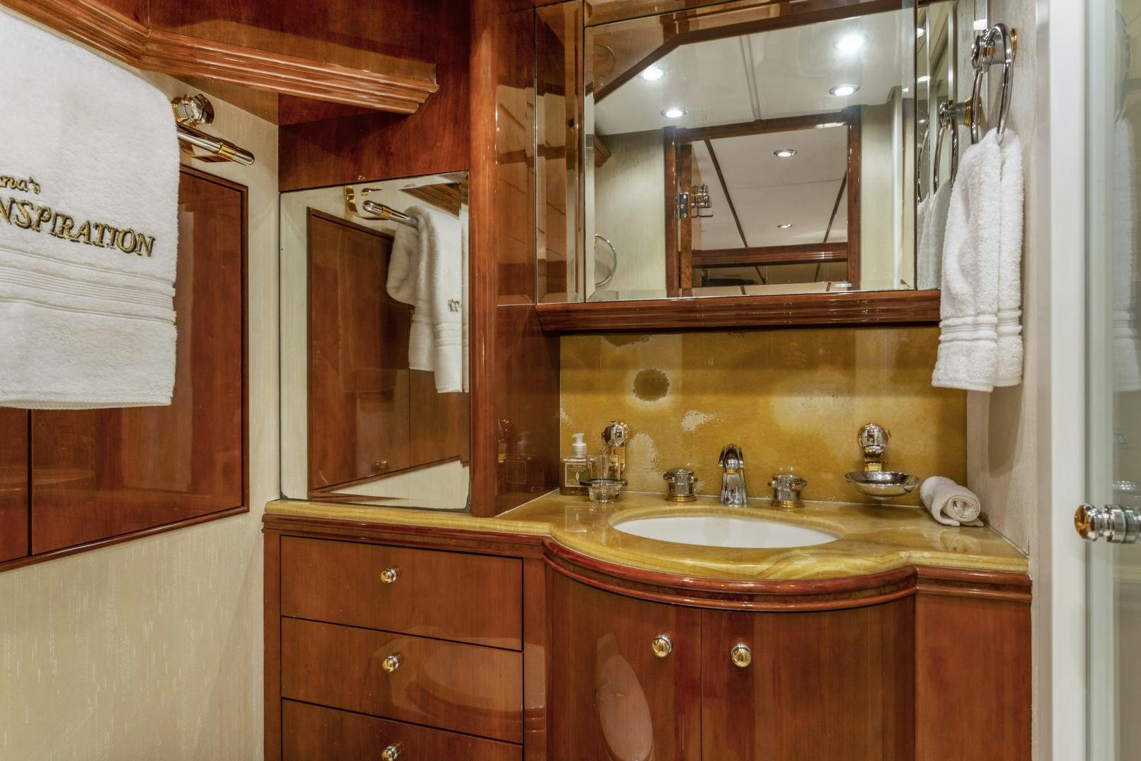 a bathroom with a sink and a mirror aboard ANA’S INSPIRATION Yacht for Sale